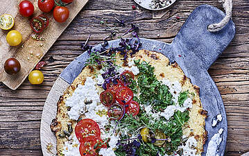 Blumenkohl Pizza mit Körnigem Frischkäse