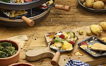 Raclette-Pfännchen España mit Chorizo und Piementos