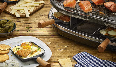 Raclette-Pfännchen Schweden mit frischem Lachsfilet