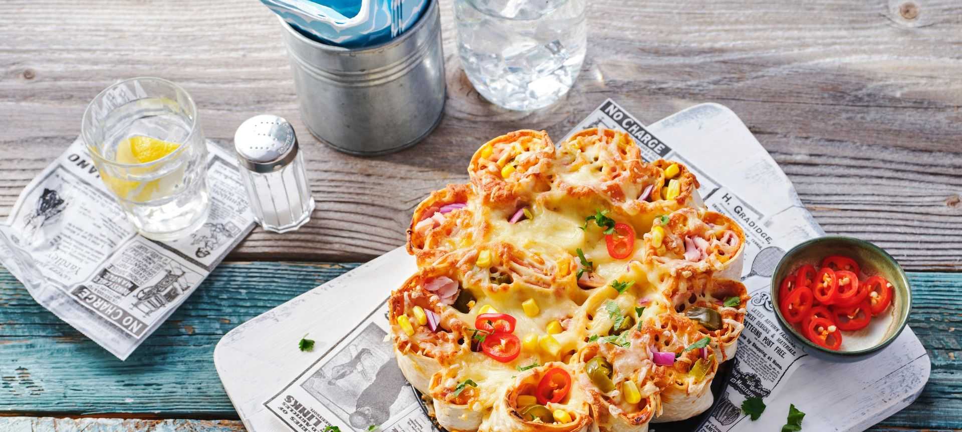 Rezeptbild für Feurige Tortilla-Torte mit überbackenem Käse